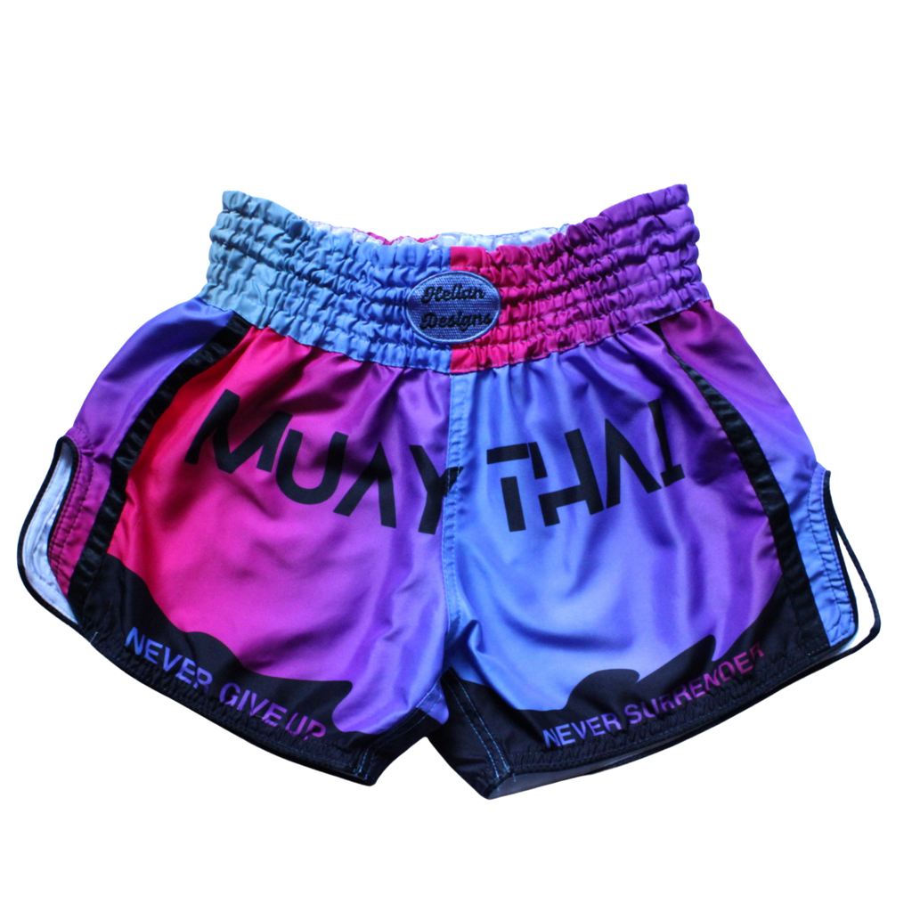 Colorful Muay Thai shorts with pink and blue gradient design on a white background.